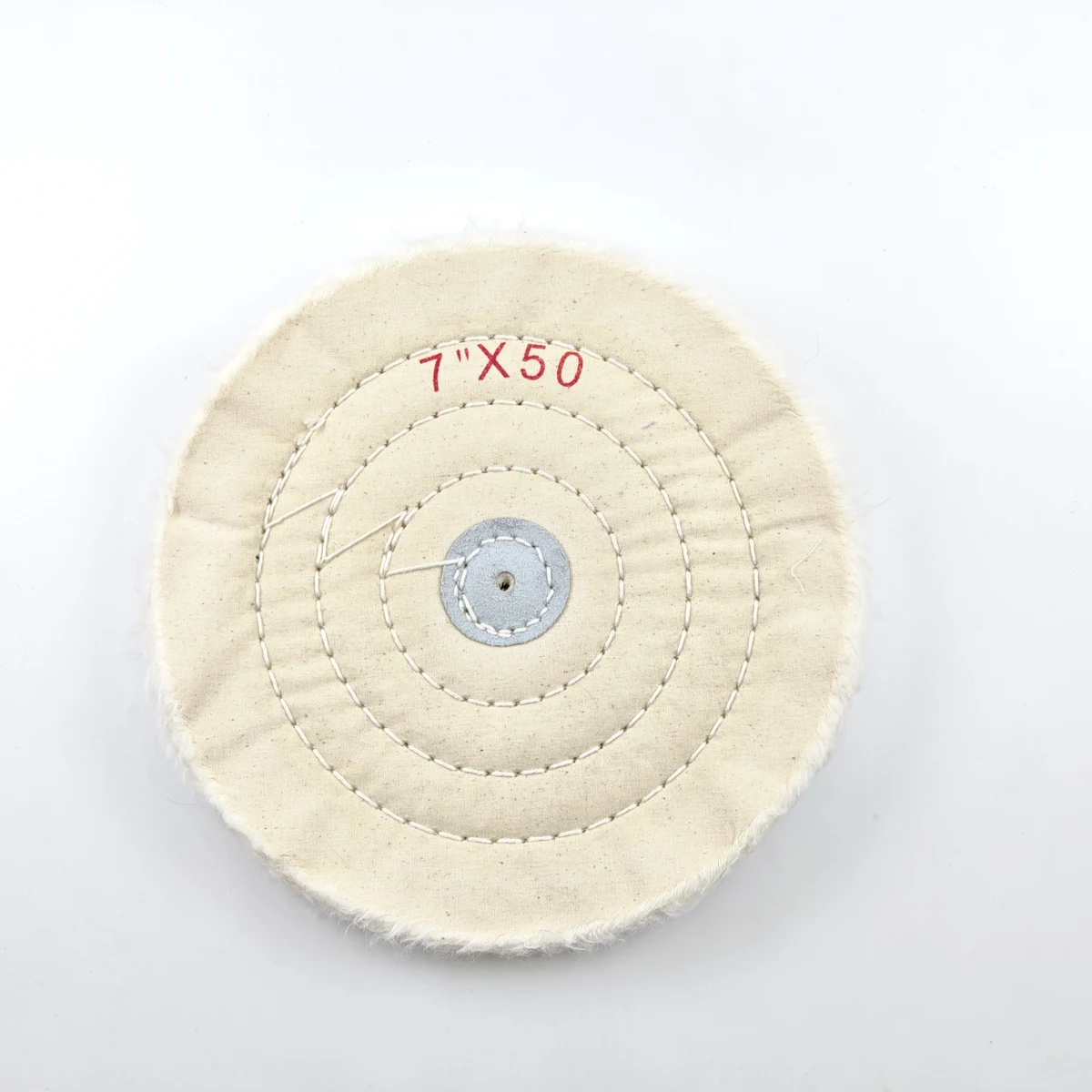 Close-up of a WanHu sewn cotton buffing wheel